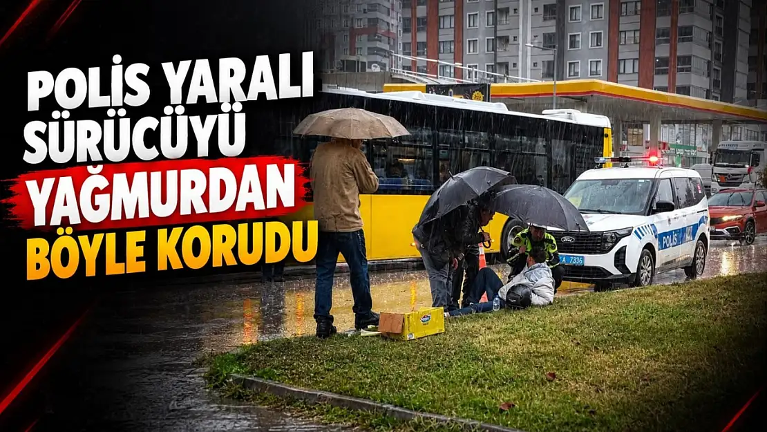 Polis Yaralı Sürücüyü Yağmurdan Böyle Korudu!