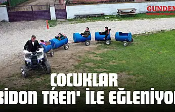 Çocuklar Muhtarın Yaptığı 'Bidon Tren' İle Eğleniyor