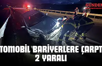 D100'de Otomobil Bariyerlere Çarptı: 2 Yaralı