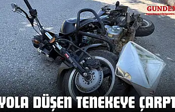 Motosiklet Yola Düşen Tenekeye Çarptı