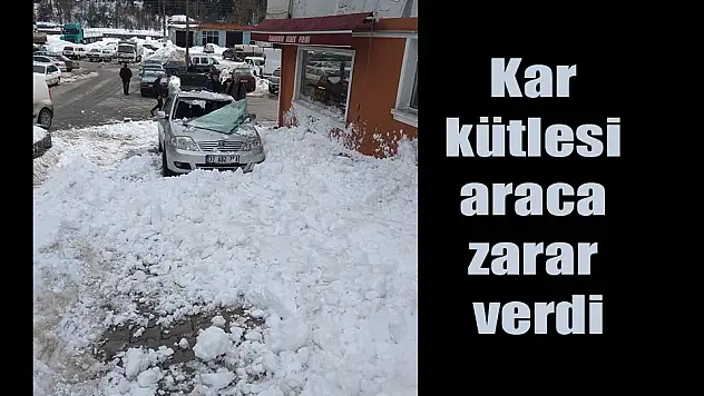 Kar kütlesi araca zarar verdi