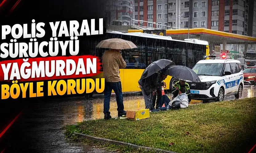 Polis Yaralı Sürücüyü Yağmurdan Böyle Korudu!