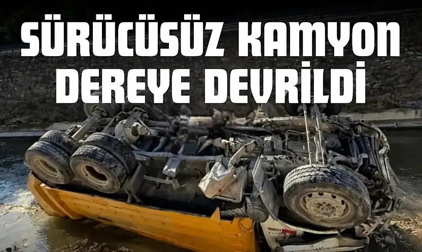 Sürücüsüz Kamyon Dereye Devrildi