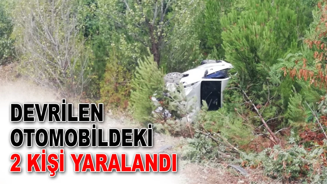 Devrilen Otomobildeki 2 Kişi Yaralandı