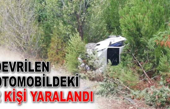 Devrilen Otomobildeki 2 Kişi Yaralandı