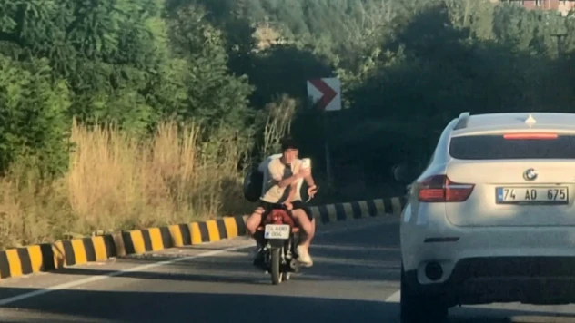 Motosiklete ters bindi