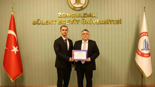 Rektör Özölçer'den , Yusuf Nas'a Tebrik